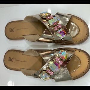 Gold metallic slide sandals with crystals stones